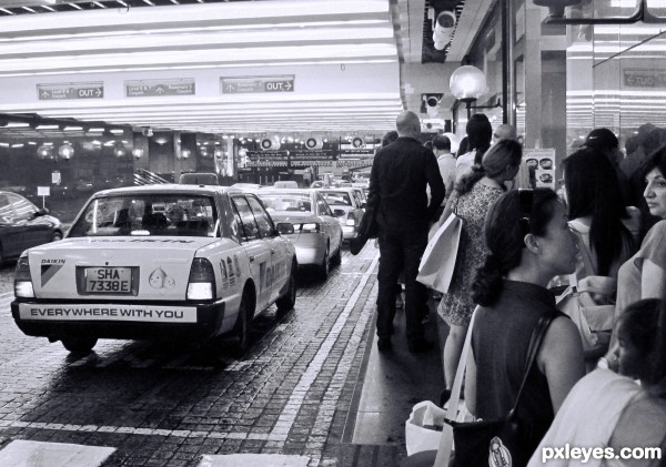 Taxi line on a wet day