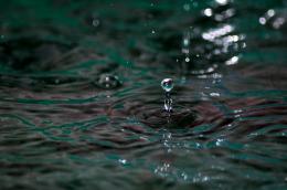 Rain hitting pool water