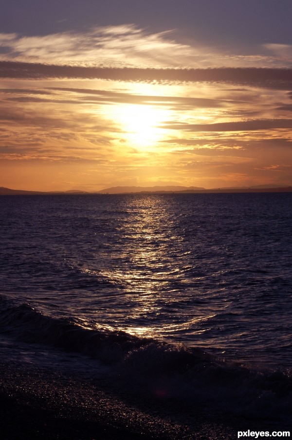 Sunset Shining on the Shore