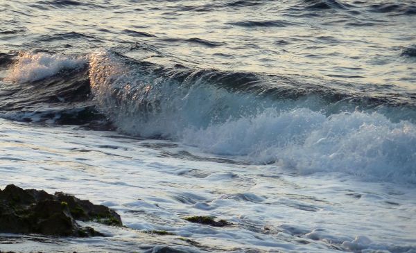 waves at the sunset