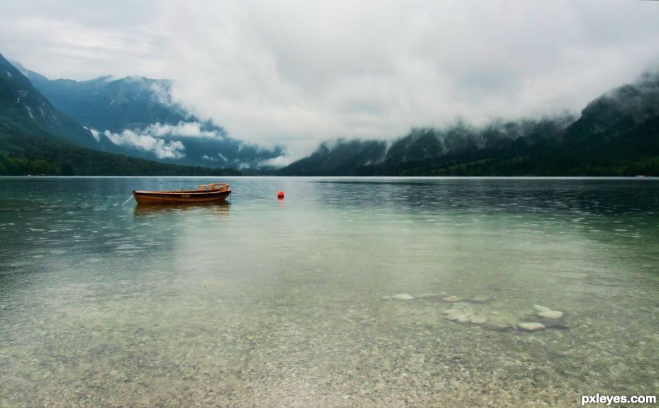 Rain and mist over Idrija lake